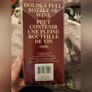 Novelty giant glass that holds a bottle of wine